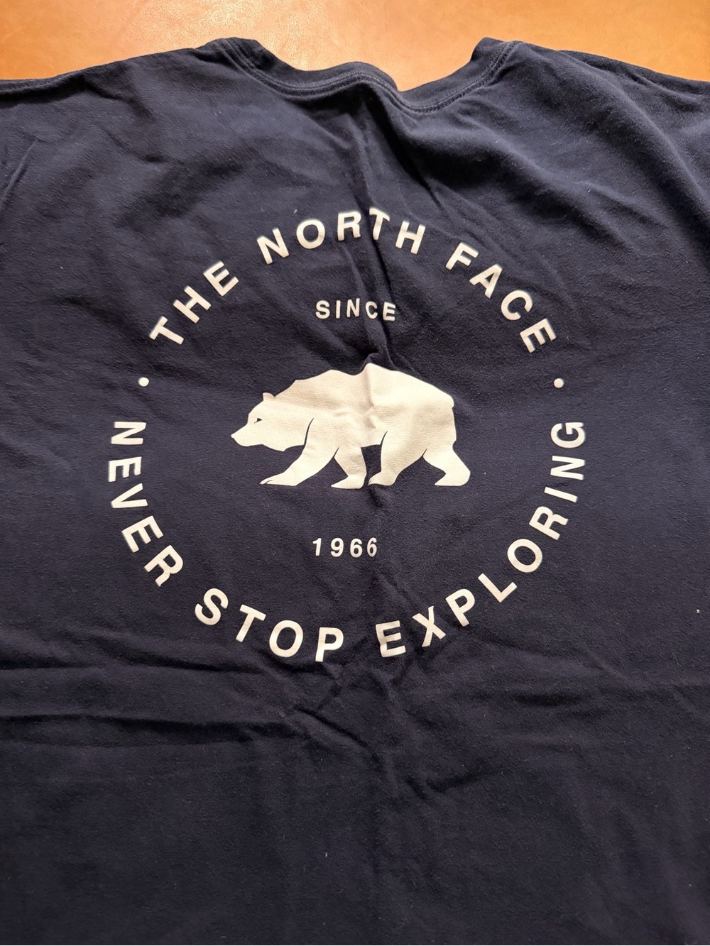 The North Face Men’s "Never Stop Exploring" Navy Graphic Tee